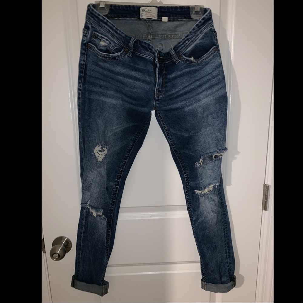 Buckle skinny jeans